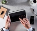 Connected manager hands communicating with many media screens, top view