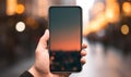 Connected Realities: Man's Hand Holds Vertical Smartphone Amidst Blurred Background Royalty Free Stock Photo