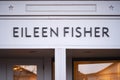 Eileen Fisher boutique store in commercial shopping district logo sign closeup. Royalty Free Stock Photo