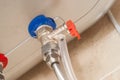 Connecting hot and cold water pipes to the boiler. Overpressure Relief Valve