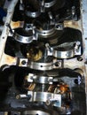 The connecting rod, piston and cylinder block in a disassembled condition