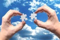 Human hands holding jigsaw puzzle pieces Royalty Free Stock Photo