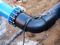 Connection HDPE pipe and main steel pipeline, gate valve.Welded plastic pipe, connection.