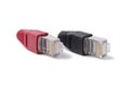 Connectors RJ45 6 category with red and black caps on a white background Royalty Free Stock Photo