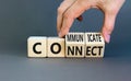 Connnect or communicate symbol. Concept word Connnect or Communicate on wooden cubes. Beautiful grey table grey background. Royalty Free Stock Photo