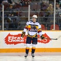 Connor McDavid in front of First Choice sign