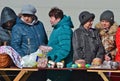 The consecration of eggs and cakes near the Church-chapel of the Intercession of the blessed virgin in Rybatsky in St. Petersburg Royalty Free Stock Photo