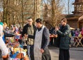 The consecration of eggs and cakes near the Church-chapel of the Intercession of the blessed virgin in Rybatsky in St. Petersburg Royalty Free Stock Photo