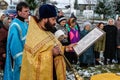 The consecration of the memorial Orthodox cross near the temple in the Kaluga region of Russia.