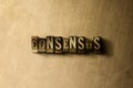 CONSENSUS - close-up of grungy vintage typeset word on metal backdrop