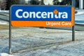 Consentra Urgent Care Clinic Exterior and Trademark Logo