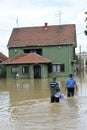 The consequences of flooding, flooded house with people.