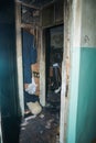 Consequences after a short circuit, burnt house interior, damaged apartment after fire, burned room, charred furniture, household