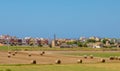 Conservation of green fodder into round yellow bales on the island of Mallorca