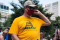 Conservative Demonstrator Wears a Gadsden Flag Shirt at a Rally