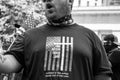 Conservative Demonstrator Wears a `One Nation Under God` Shirt at a Rally