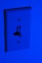 Conserving Power with Light Switch Off Royalty Free Stock Photo