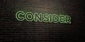 CONSIDER -Realistic Neon Sign on Brick Wall background - 3D rendered royalty free stock image Royalty Free Stock Photo