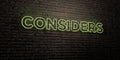 CONSIDERS -Realistic Neon Sign on Brick Wall background - 3D rendered royalty free stock image