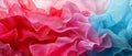 It consists of layers of translucent fabric in shades of red, orange, and blue, creating a wave-like effect that evokes
