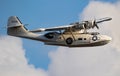 Consolidated PBY-5A Canso Catalina Miss Pick Up amphibious plane flying over Sanicole Airport during sunset. Belgium. September