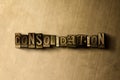 CONSOLIDATION - close-up of grungy vintage typeset word on metal backdrop