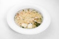 Consomme with hommade chicken. Bouillon with noodles and eggs. Royalty Free Stock Photo