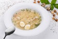 Consomme with hommade chicken. Bouillon with noodles and eggs. Royalty Free Stock Photo