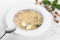 Consomme with hommade chicken. Bouillon with noodles and eggs. Royalty Free Stock Photo