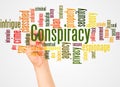 Conspiracy word cloud and hand with marker concept Royalty Free Stock Photo