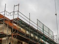 Consruction site, scaffolding around house Royalty Free Stock Photo