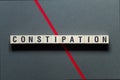 Constipation - word concept on cubes Royalty Free Stock Photo