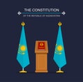 The Constitution book and flag of the Republic of Kazakhstan.