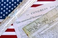 Constitution of the USA with US flag. Aged historical documents Royalty Free Stock Photo