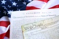 Constitution of the USA with US flag. Aged historical documents Royalty Free Stock Photo