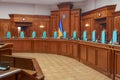 Constitutional Court of Ukraine law. Emblem of Ukraine trident logo. Empty courtroom trial court of law justice symbol