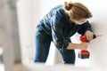 Constractor handyman working and using screwdriver Royalty Free Stock Photo