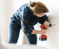 Constractor handyman working and using screwdriver Royalty Free Stock Photo