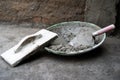 construcation wooden plaster tool and mixed concrete cement at site for plastering. Royalty Free Stock Photo