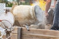 Construction Worker Mixing Cement At Construction Site Royalty Free Stock Photo
