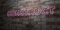 CONSTRUCT - Glowing Neon Sign on stonework wall - 3D rendered royalty free stock illustration