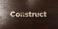 Construct - grungy wooden headline on Maple - 3D rendered royalty free stock image