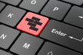 Constructing concept: Bricks on computer keyboard background Royalty Free Stock Photo