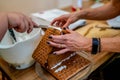 Constructing a festive ginger bread house Royalty Free Stock Photo