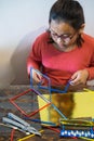 Constructing with lots of colorful plastic sticks. fun with building geometric figures and learning mathematics at home. Royalty Free Stock Photo