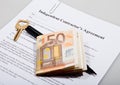 Construction agreement with key and Euro notes Royalty Free Stock Photo