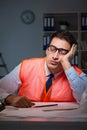 The construction architect working on drawings late at night Royalty Free Stock Photo