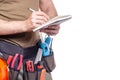 Construction belt on a man with diary notebook a pen tool belt builder