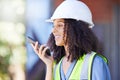 Construction, black woman and phone call with microphone for voice speaker, audio recording and talking for project