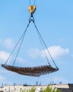 Construction of brick house. crane lowers load Royalty Free Stock Photo